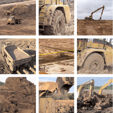 Dump trucks, loaders, and excavators placing virgin-cut dredge fill on a Great Bear Construction civil site
